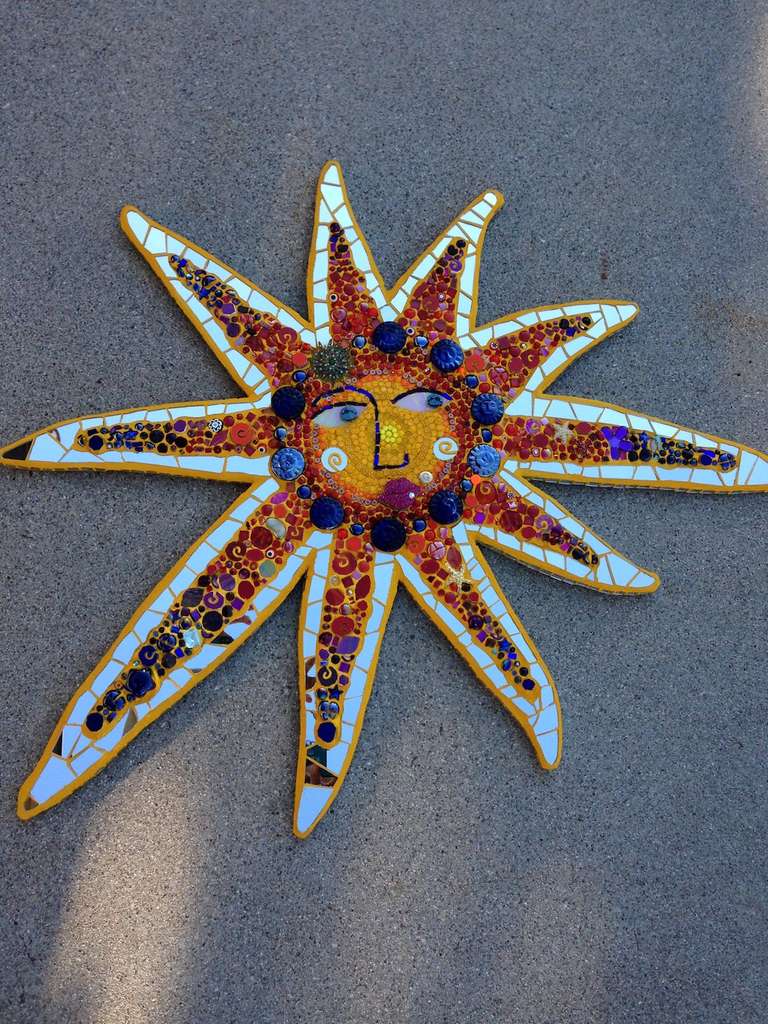 Bling Me Some Sunshine. 2013 Stained glass, glass fusions, sentimental pieces, gems, beads, mirror, tinted mortar and grout. 31