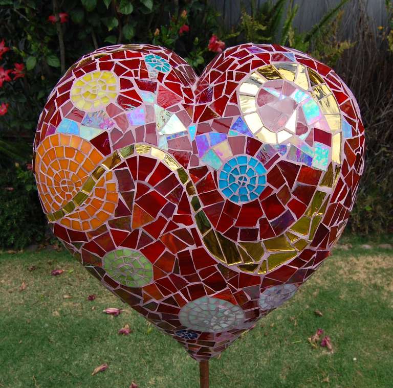 Heart of the garden.  2010 Light weight concrete sculpture, stained glass and gold mirror.