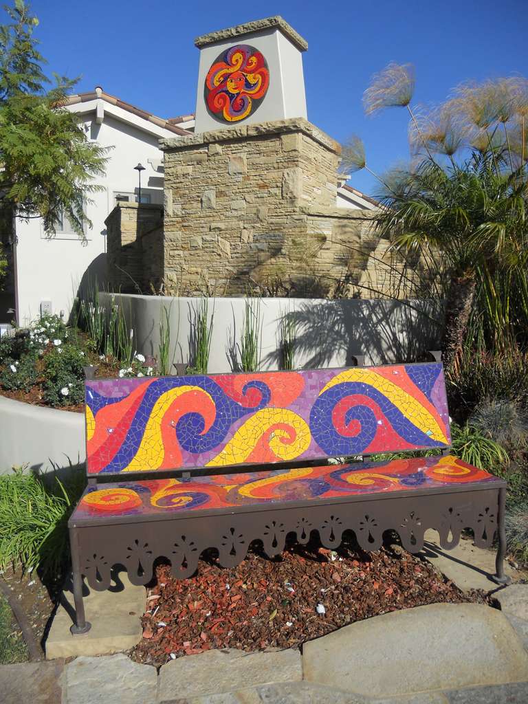 Swirling Bench. 2013  Ceramic tile, glass fusions & epoxy sparkly grout.  Bench framed designed by David Shelton.  6'x18