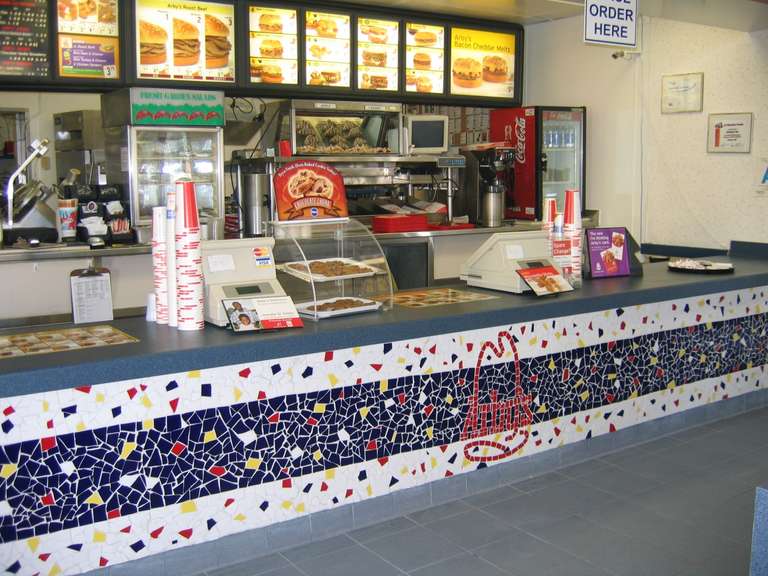 Arby’s.  2006  Cement board, ceramic tile and white grout.  18'x2.5'